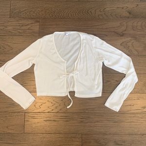 Front tie long sleeve over top/sweater.